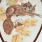 Vintage Porcelain Squirrel Wall Plaques Set of 2 Hand Painted Signed E.M.Woolever